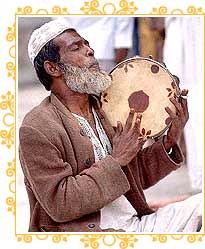 Man Playing Drum in Mosque, Ajmer