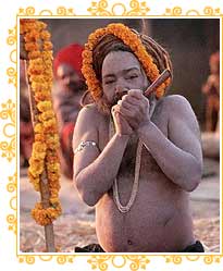 Sadhu Smokes at Kumbh Mela